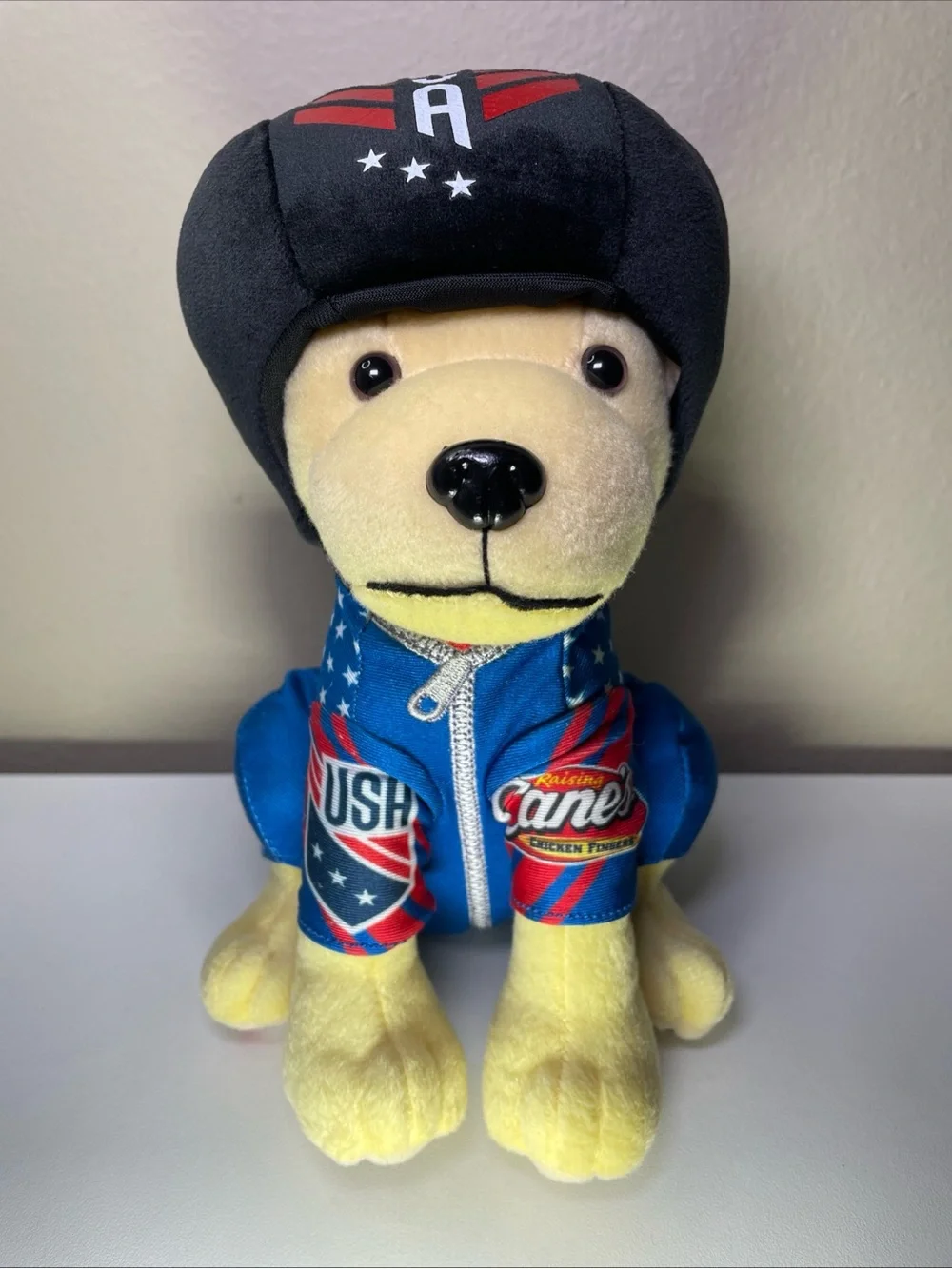 Raising Canes USA Plush Dog stuffed animal 2026 Bobsled Collectirs Edition